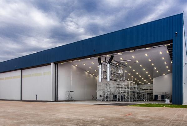 Exterior of airplane hangar.