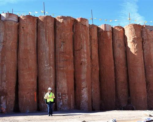 Retaining wall piles under construction